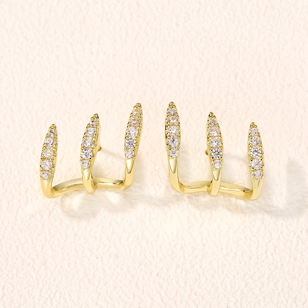 Elegante Ohrringe mit Strasssteinen und drei Krappen