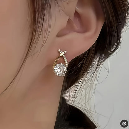 Ohrstecker mit goldenem Kreuz und Zirkonia