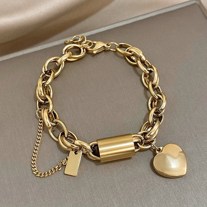 Breites Herzarmband aus Gold