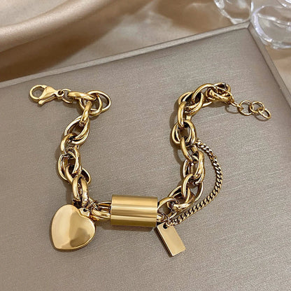 Breites Herzarmband aus Gold