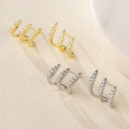 Elegante Ohrringe mit Strasssteinen und drei Krappen